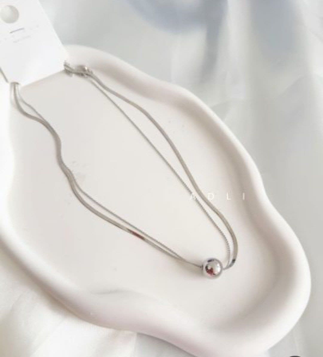 گردنبند دولاین توپی